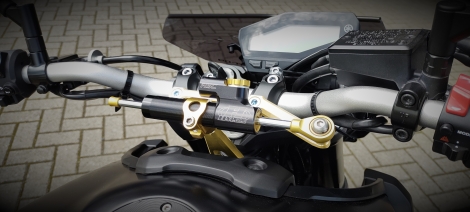 Kit fixation pour amortisseur de direction